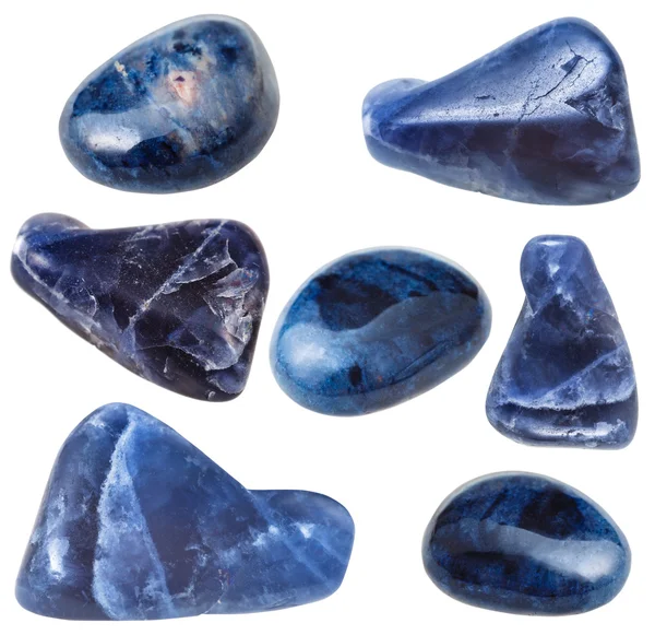 Varias piedras de gema de dumortierita aisladas en blanco —  Fotos de Stock