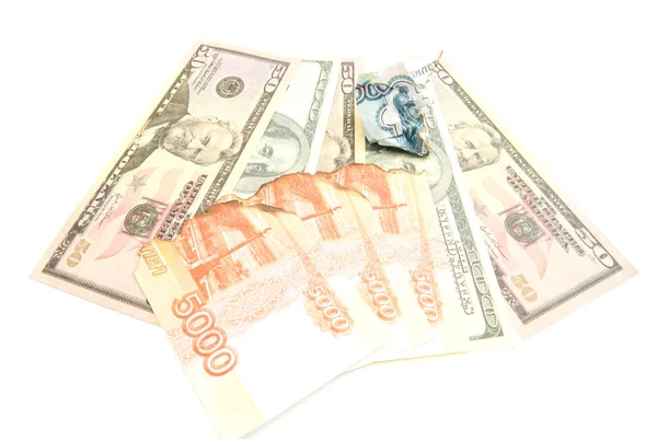 Verkoolde roebels en dollars — Stockfoto