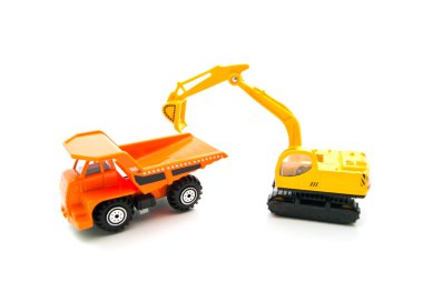 turuncu kamyon ve sarı beko