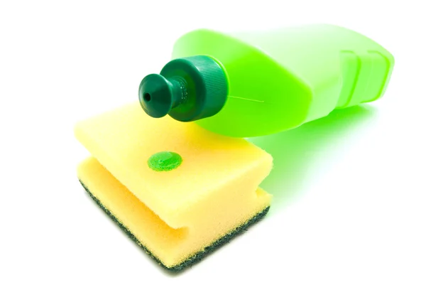 Esponja y botella verde —  Fotos de Stock