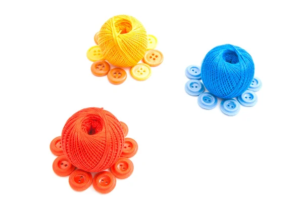 Buttons and three balls of yarn — Stock Photo, Image