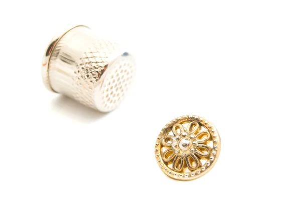 Plastic button and thimble — Stock Photo, Image