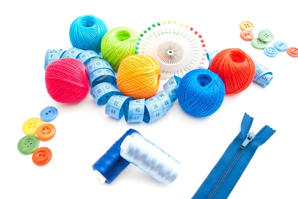 Zipper and other items for needlework on white — Stock Photo, Image