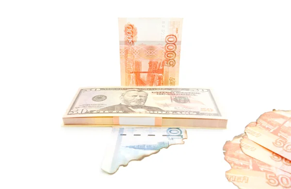 Dollars and burnt rubles on white — Stock Photo, Image