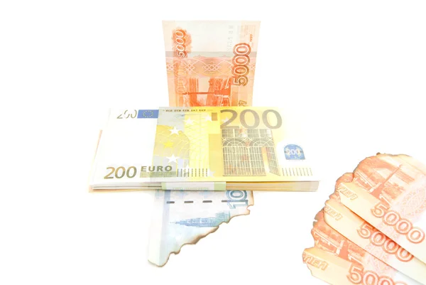 Euros and burnt rubles on white — Stock Photo, Image