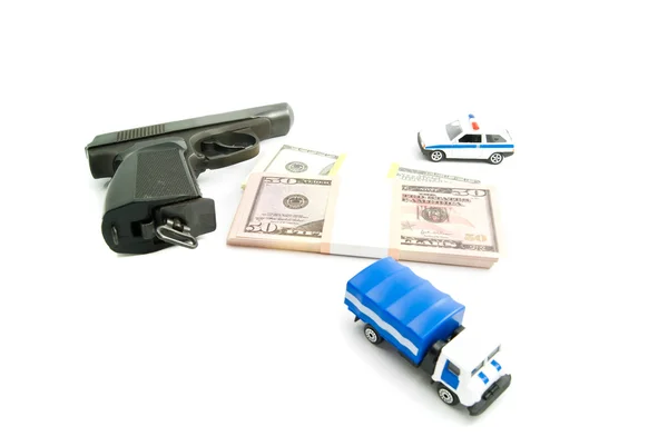 Gun, banknotes and police cars — Stock Photo, Image