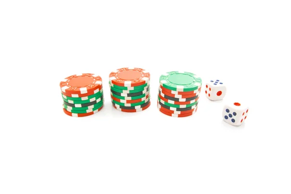 Three stacks of chips and dice — Stock Photo, Image