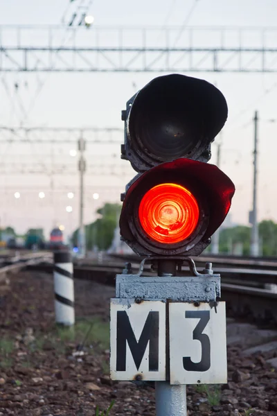 Red semaphore signal on railway in summer time — Stock Photo, Image