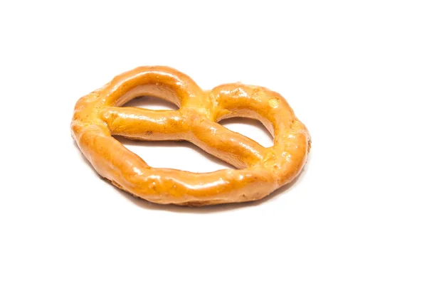 Saboroso pretzel salgado em branco — Fotografia de Stock