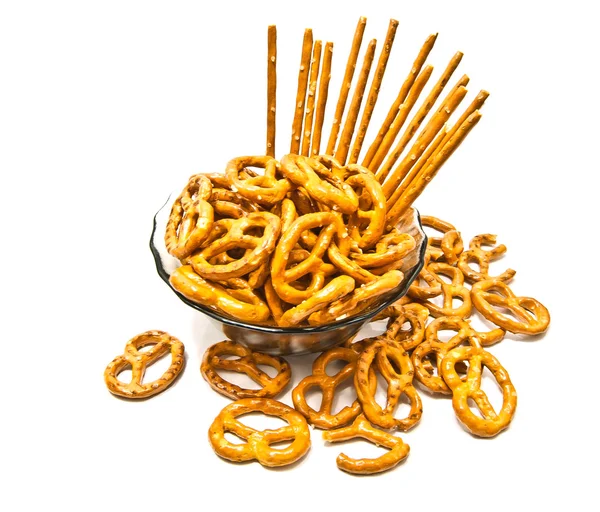 Many breadsticks and pretzels on a plate — Stock Photo, Image