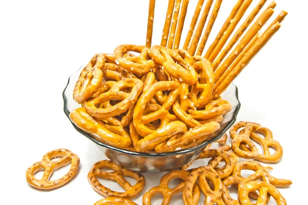 Tasty breadsticks and salted pretzels — Stock Photo, Image