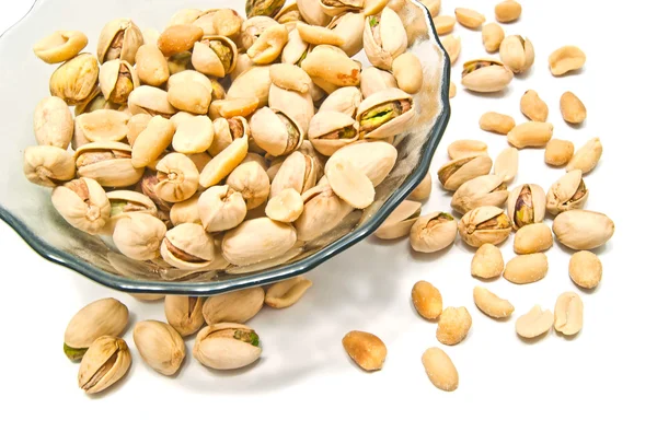 Tasty peanuts and pistachios — Stock Photo, Image