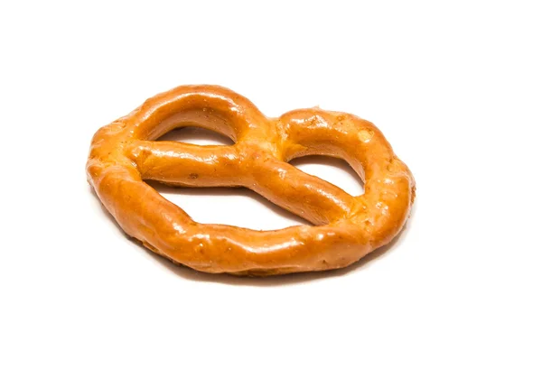 Único pretzel salgado em branco — Fotografia de Stock