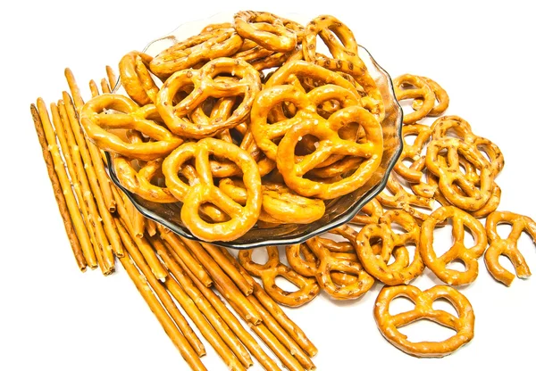 Många breadsticks och pretzels närbild — Stockfoto