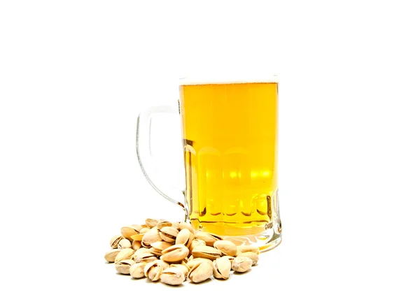 Mug of beer and some tasty pistachios — Stock Photo, Image