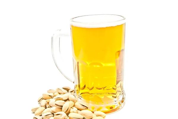 Mug of beer and some pistachios — Stock Photo, Image