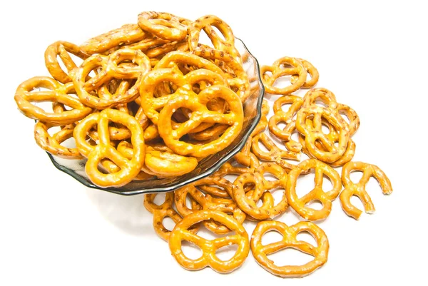 Some salted pretzels on white — Stock Photo, Image