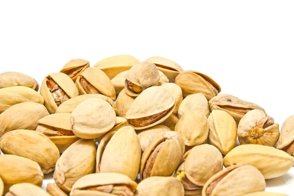 Montón de muchos pistachos asados — Foto de Stock