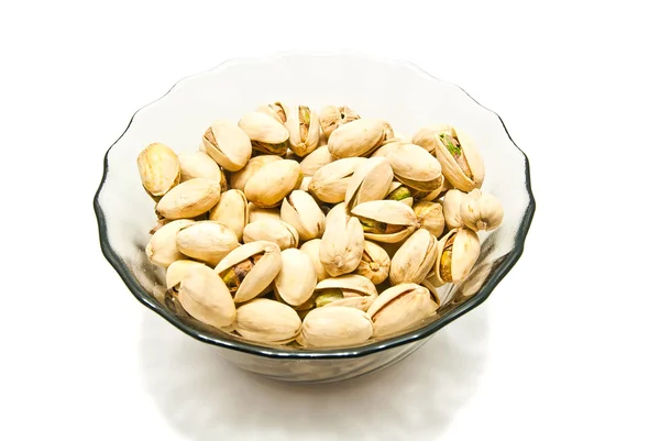 Dish with roasted pistachios — Stock Photo, Image