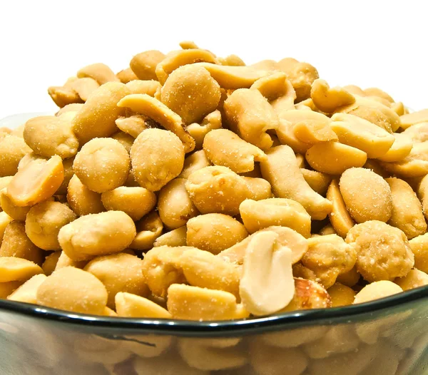 Glass dish with peanuts — Stock Photo, Image