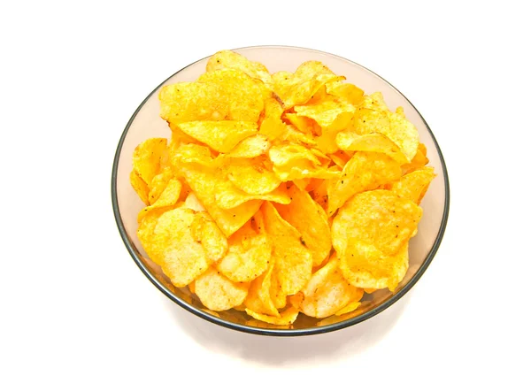 Chipsy w misce szkła — Zdjęcie stockowe