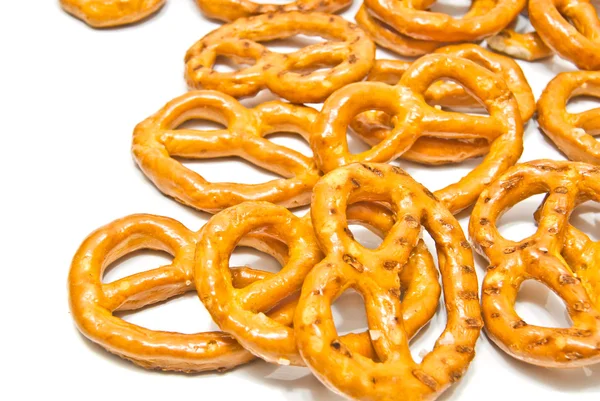 Salted pretzels closeup on white — Stock Photo, Image