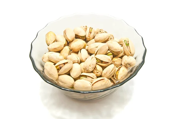 Dish with roasted pistachios closeup — Stock Photo, Image