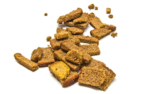 Many tasty rye crackers closeup — Stock Photo, Image