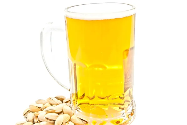 Mug of beer and some pistachios closeup — Stock Photo, Image