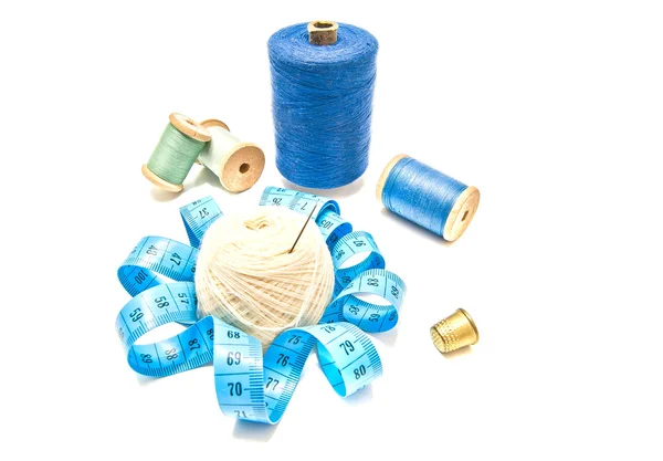 Different spools of thread and yarn on white — Stock Photo, Image