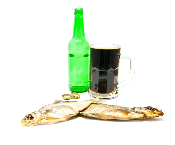 glass of beer and salted fishes closeup