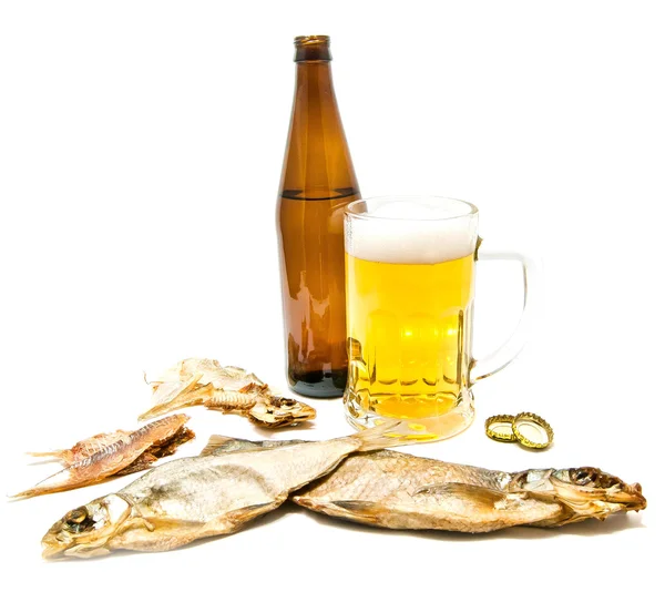 Salty fishes and glass of beer on white — Stock Photo, Image