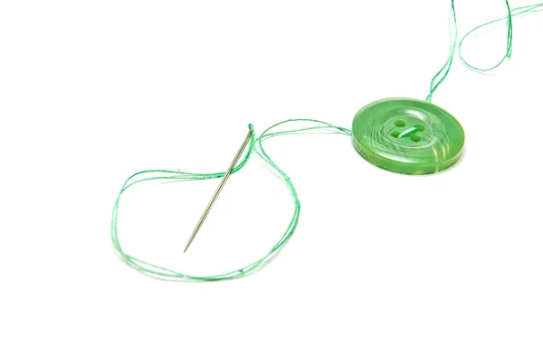 Green thread and green button — Stock Photo, Image