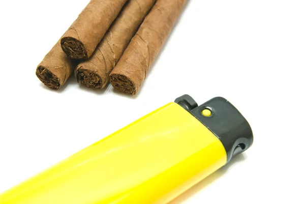 Few cigars and yellow lighter — Stock Photo, Image