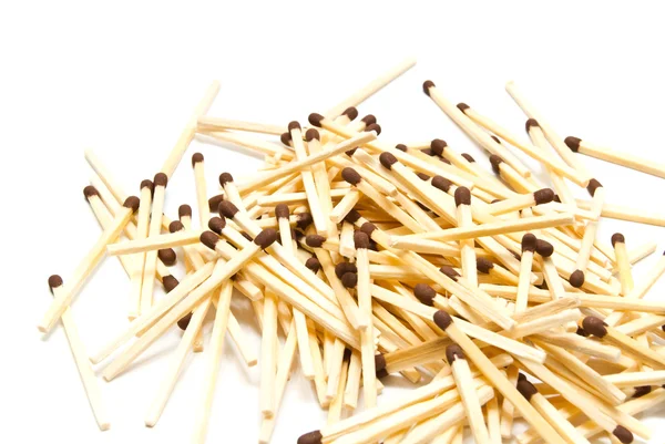 Small heap of matches on white — Stock Photo, Image