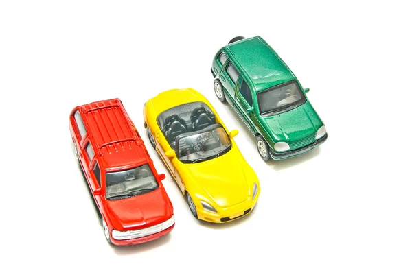 Drei verschiedene Autos auf weiß — Stockfoto