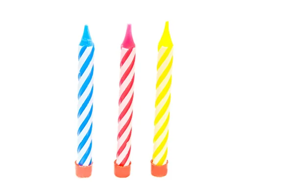 Три цветных свечи для торта — стоковое фото