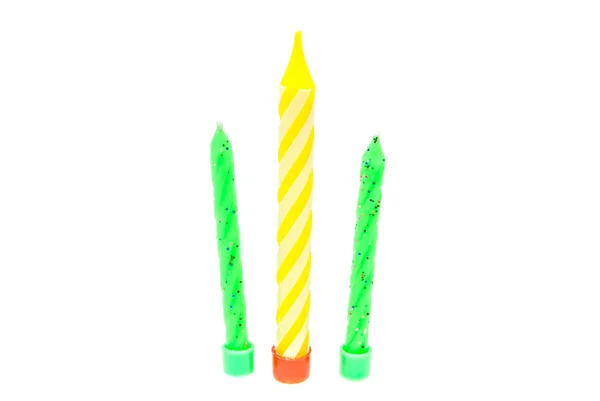 Drie verschillende kaarsen op wit — Stockfoto