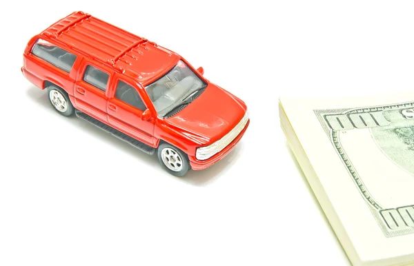 Red car and dollar notes — Stock Photo, Image