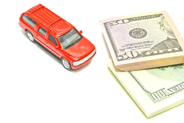 Single red car and dollar notes — Stock Photo, Image