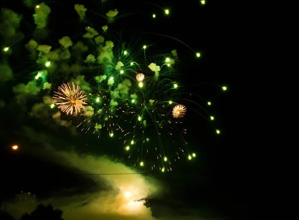 Magnificent green fireworks in the night sky — Stock Photo, Image