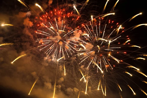 Fireworks with smoke in the night sky — Stock Photo, Image