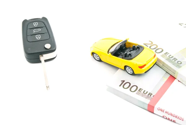 Sport auto met sleutels en geld — Stockfoto