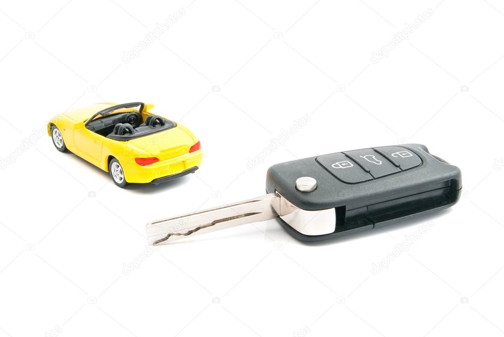keys and sport car on white