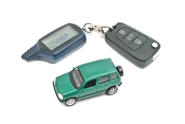 Green car and keys on white — Stock Photo, Image