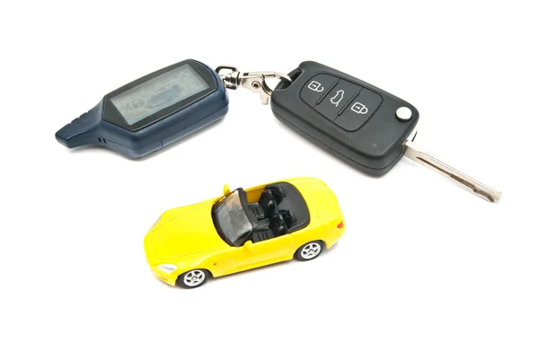 Yellow car and keys with alarm — Stock Photo, Image