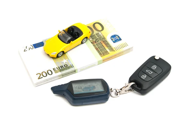 車のキー、黄色の車や紙幣 — ストック写真