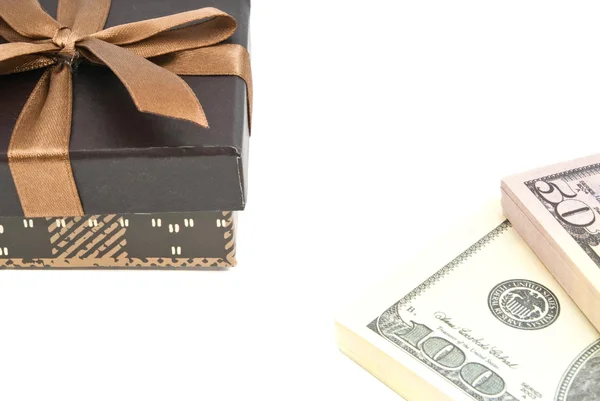 Brown gift box and money on white — Stock Photo, Image