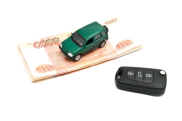 Banknotes, keys and green car — Stock Photo, Image