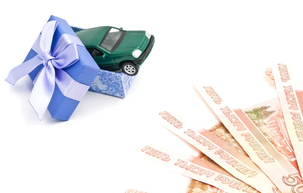 Green car in blue gift box and money — Stock Photo, Image